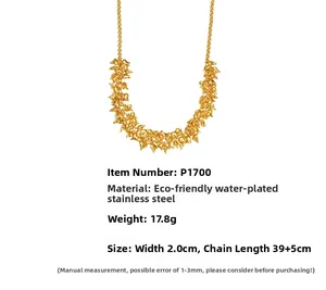 Detail view of 18k gold plated stainless steel necklace with hollow heart shaped pendants