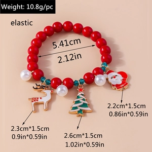 Detailed view of Christmas beaded bracelet with Santa Claus, Reindeer and Tree charms