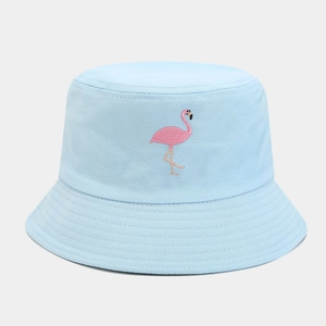 Close-up of pink flamingo embroidery on light blue cotton twill bucket hat