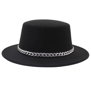 Detail of black flat top boater hat featuring a bold polished silver metal chain band