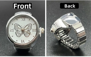 Front and back views of a silver ring watch featuring a butterfly dial and elastic band