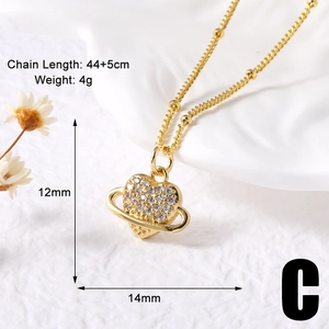Detailed view of gold heart Saturn necklace with cubic zirconia showing 14mm size and 4g weight