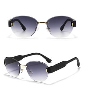 Detail view of purple gradient rimless sunglasses with gold accents and logo temples