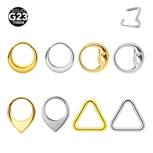 Solid G23 titanium hinged rings in gold and silver with triangle and moon face designs