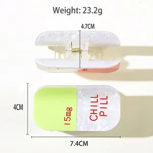 Sparkly pill-shaped hair claw clip with Chill Pill text and size dimensions