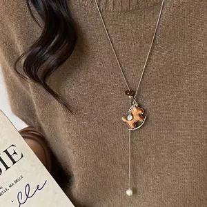 Retro rocking horse pendant necklace with small diamonds and pearl on silver chain