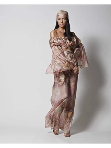 Detail of floral chiffon off-shoulder crop top and wide-leg trousers set for women