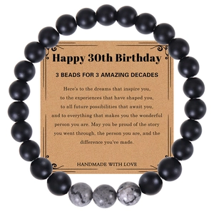 Handmade 30th birthday bead bracelet with natural map stone on a kraft greeting card