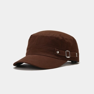 Detail of dark brown cotton military cap featuring side buckle strap and silver rivets