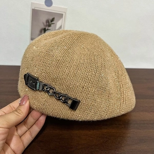 Chic camel wool knit beret with subtle sequins and decorative gunmetal chain link