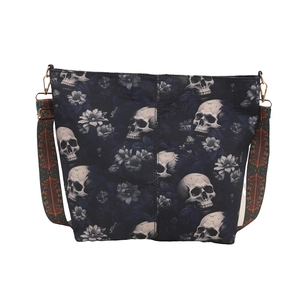 Black canvas tote bag with retro skull and floral print featuring wide shoulder strap