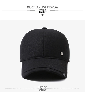 Detail of black winter baseball cap featuring metal logo plate and SPORT textile label