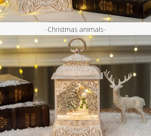 Vintage white Christmas lantern with snowman scene and white deer figurine set
