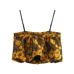 Top corto nero con fiori dorati in jacquard e orlo a palloncino plissettato