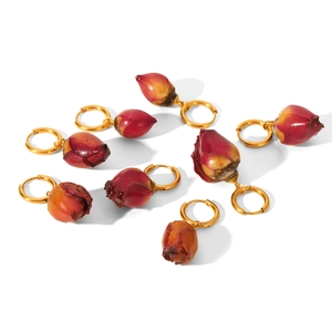 Gold plated stainless steel rose bud drop earrings with realistic red dried flowers