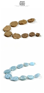 Detail of natural tower-shaped crystal slices in gold and light blue for DIY jewelry