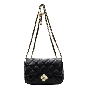 Black quilted leather chain bag with a gold clover clasp and crossbody strap
