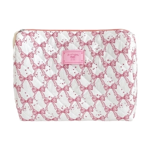 Quilted white cosmetic bag with pink bow pattern and Good Night label front view