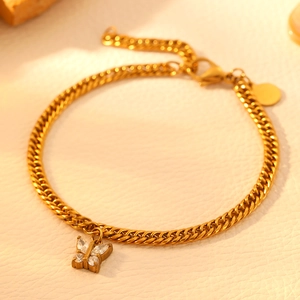 Gold-plated stainless steel bracelet with a sparkling butterfly pendant and cubic zirconia
