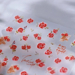 3D luxury red rose nail art stickers with elegant floral patterns and artistic script