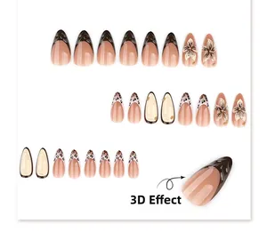 Detail of almond-shaped press-on nails featuring 3D floral accents and leopard patterns