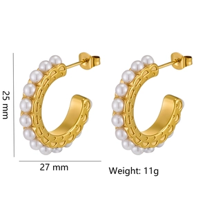 Elegant gold-plated C-shaped earrings with white pearls and vintage embossed metal base