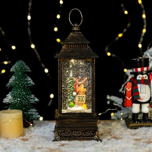 Lanterne de Noël bronze avec renne, effet neige et éclairage LED festif scintillant