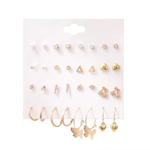 16 pairs of gold geometric earrings set with pearls and star charms on display card