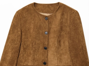 Detailed close-up of brown faux suede jacket featuring a round neck and black buttons