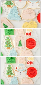 Close-up of Christmas cookies in tree, bell and Santa shapes with Oh My Deer engraving