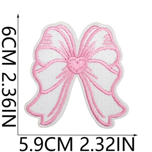 Pink and white embroidered bow patch with heart detail, size 6cm for clothing decor