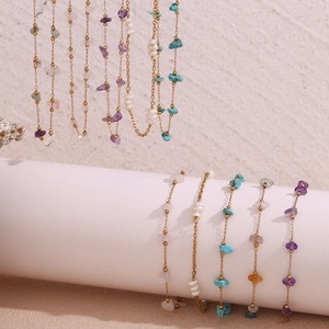 Detail of 18K gold-plated stainless steel chain with natural crushed stones and pearls