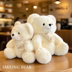 Plush teddy bear set with scarves and smile label on warm wooden table background