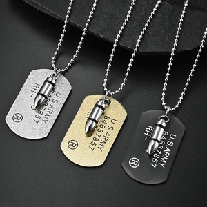 Set of three US Army dog tag necklaces with bullet pendants in silver, gold, and black steel