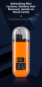 Detail of nose hair trimmer featuring digital power display and rounded safety blade