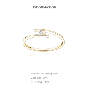 Detailed view of the S925 sterling silver ring with gold plating and a single diamond