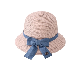 Pink straw sun hat with blue denim bow and handmade label for children and moms