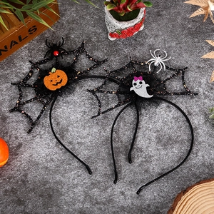 Halloween headband set featuring glitter pumpkin and ghost with mesh spider web decorations