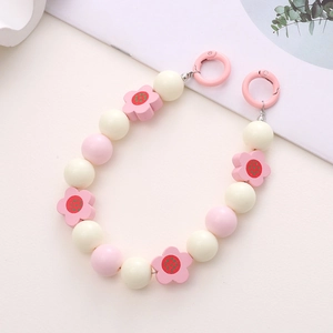 Handmade wooden flower beaded phone strap with cream and pink beads and round clasps