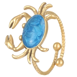 Anello regolabile a granchio dorato con pietra blu scintillante e texture in metallo