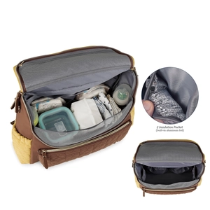 Detail of the diaper bag showing two insulated foil pockets for temperature control