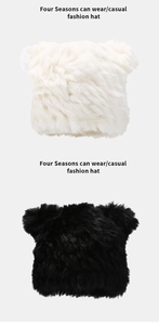 Detailansicht der flauschigen Plüschstruktur und Panda-Ohren der winterlichen Strickmütze