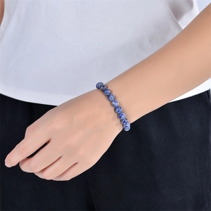 Solar system natural stone planet bead bracelet on wrist with elegant blue patterns