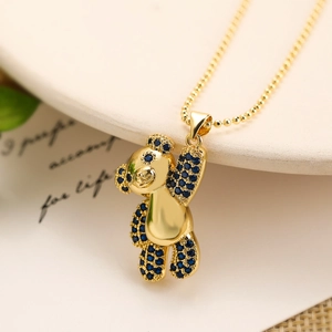 Collier pendentif ours doré avec cristaux bleus et chaîne à billes pour femme
