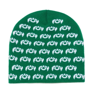 Detailed knit texture and green monster teeth jacquard pattern on the winter beanie