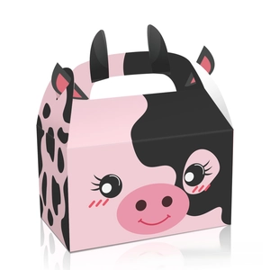 Detailed view of 3D cow-themed gift box featuring black and pink spots with carry handle