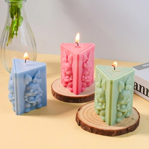 Detailed relief of cartoon bunnies on colorful scented candles with wooden bases