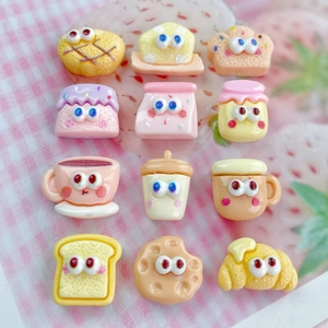 Detailed view of 12 mini resin bread and drink charms with cute cartoon eyes for DIY crafts