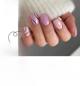 Short square press-on nails in pink and purple with hand-painted black lines and glitter