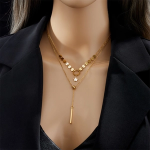Double-layered gold titanium steel necklace with star pendant and sequins on model
